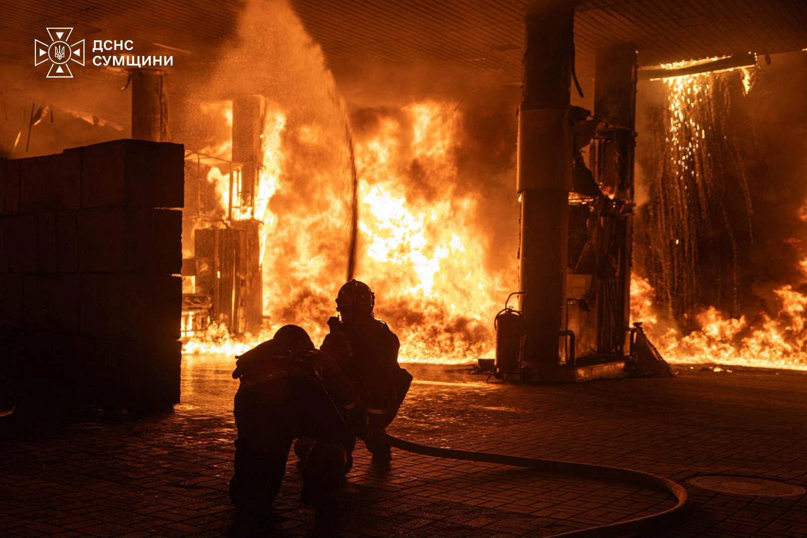 Firefighters work at the site of a petrol station hit by a Russian drone strike, amid Russia's attack on Ukraine, in Sumy, Ukraine, in this handout picture released July 23, 2026. Press service of the State Emergency Service of Ukraine/Handout via REUTERS ATTENTION EDITORS - THIS IMAGE HAS BEEN SUPPLIED BY A THIRD PARTY. DO NOT OBSCURE LOGO.