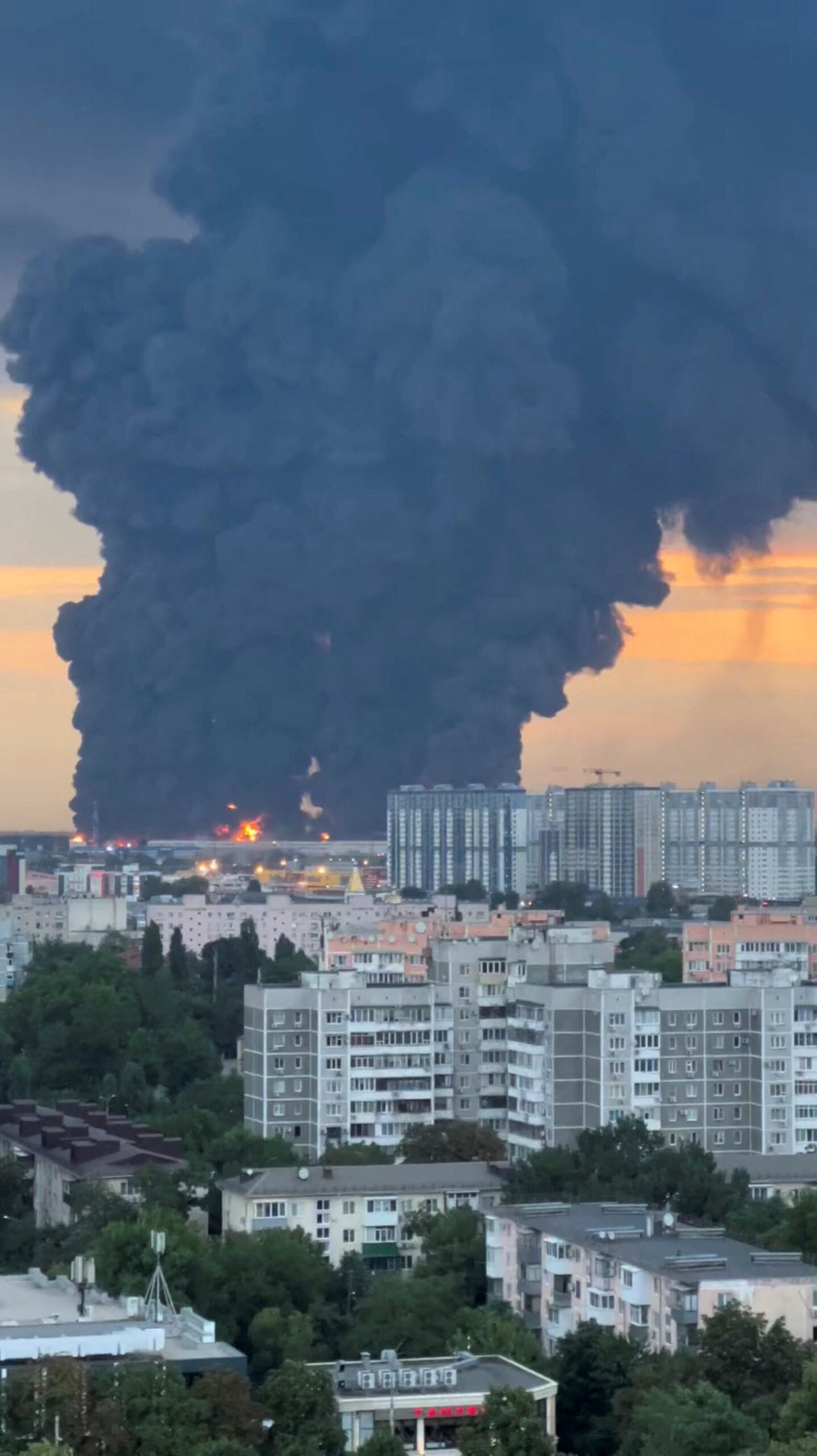 Smoke rises from a Wildberries warehouse on fire after an attack in Krasnodar, Russia, July 22, 2026, in this still image obtained from social media video.  Social Media/via REUTERS  THIS IMAGE HAS BEEN SUPPLIED BY A THIRD PARTY. NO RESALES. NO ARCHIVES. NEWS USE ONLY.      VERIFICATION:  - Buildings, roofs, vegetation and road layout matched archive and satellite images.  - Date confirmed by reports from local authorities and Wildberries company.  - Krasnodar Mayor Yevgeny Naumov wrote on Telegram on July 22 that fire broke out at a logistics warehouse after drone attack in Krasnodar.  - Tatyana Kim, the head and co-founder of Wildberries, said on Wednesday on Telegram that warehouses in Krasnodar had been attacked.